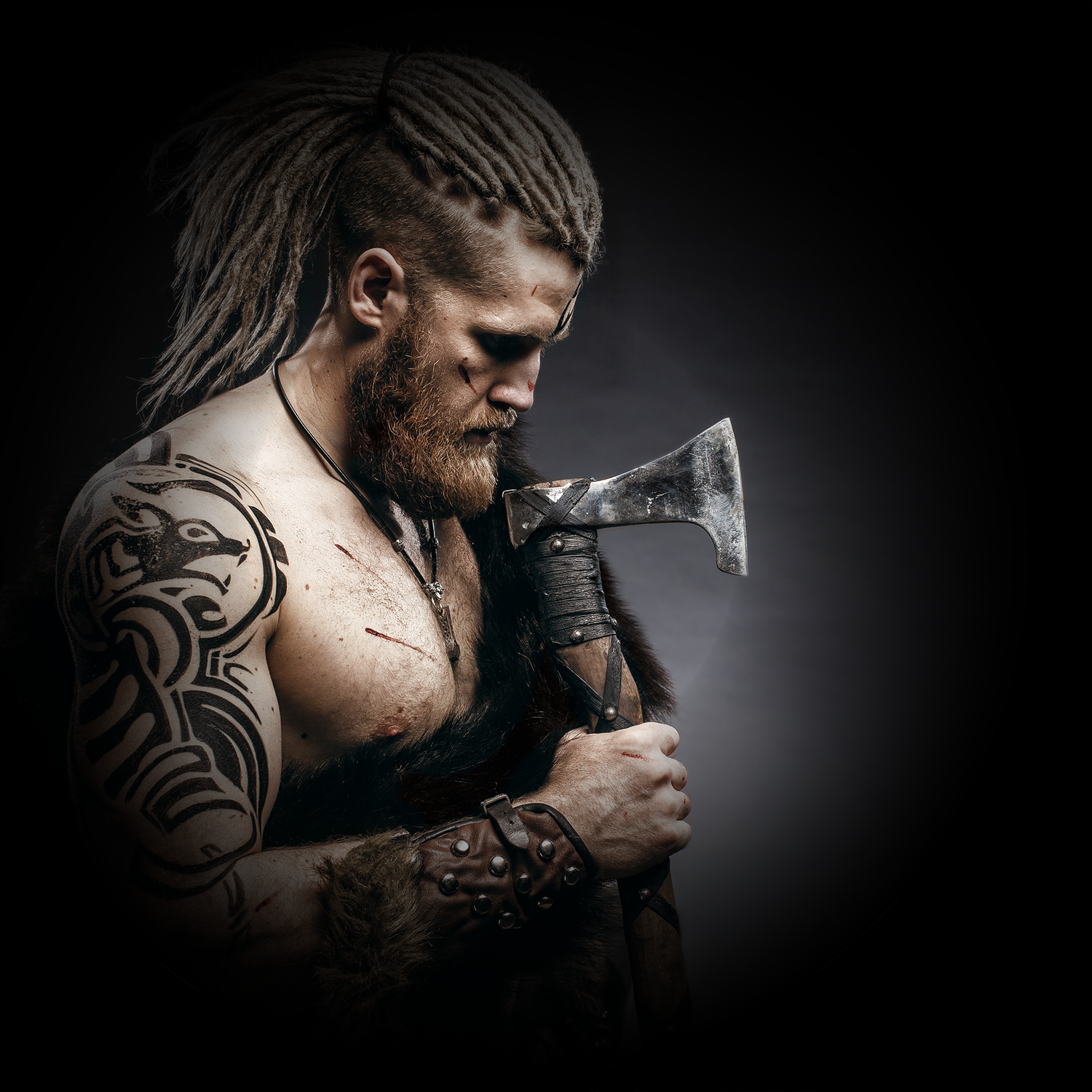 Strong Viking gripping an axe.
